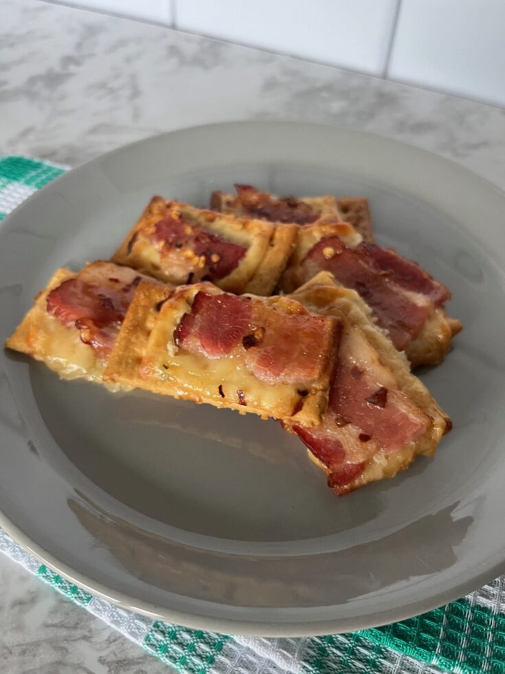 Cheesy Baked Candied Bacon Crackers